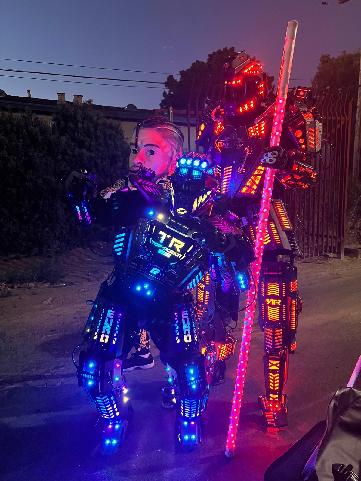 Futuristic illuminated robot performer